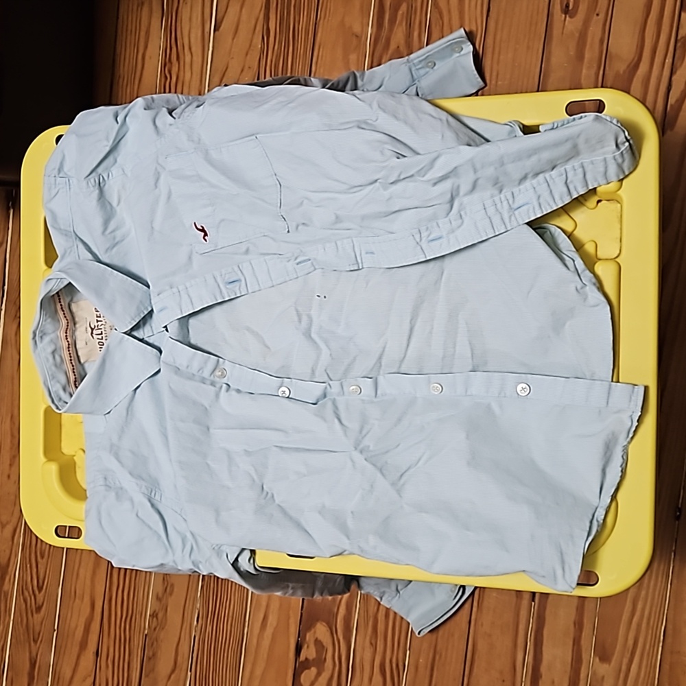 Hollister blue dress shirt (light stain like Coffee on back)